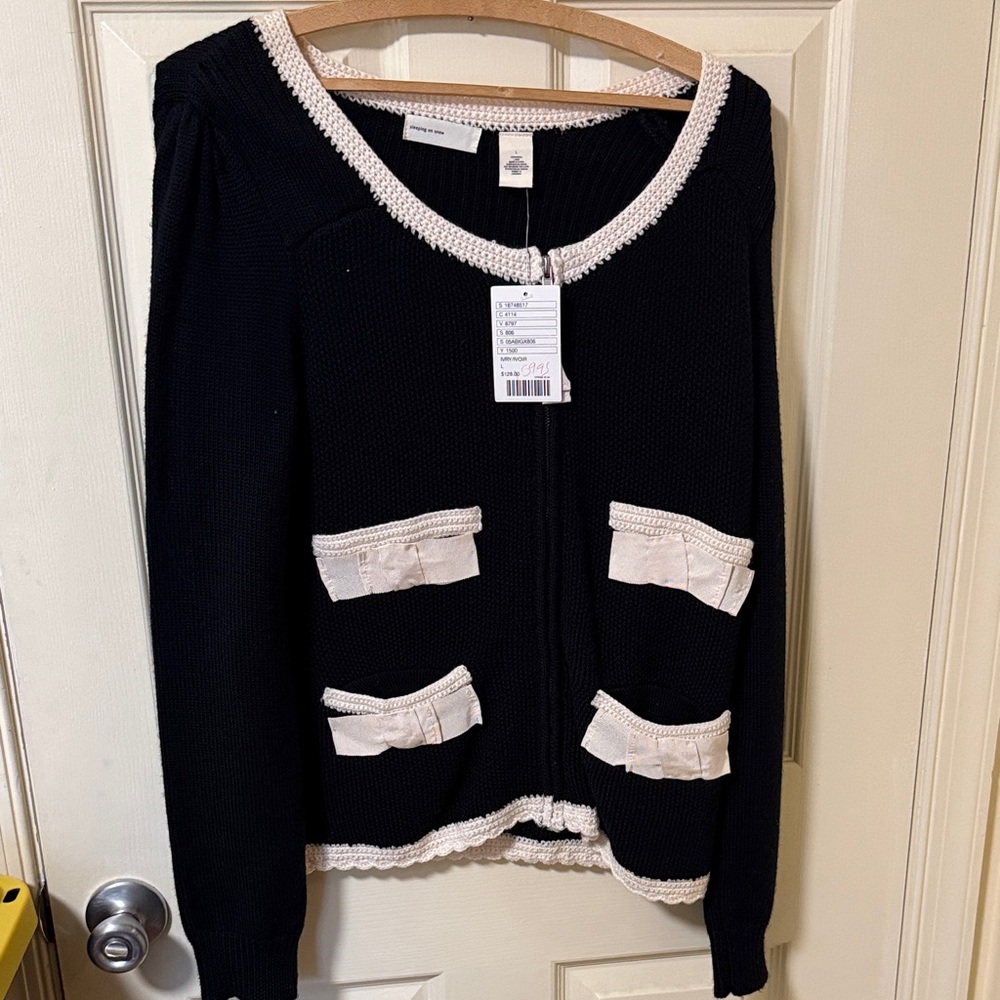 Elegant Black and Cream Cardigan with Bow Details